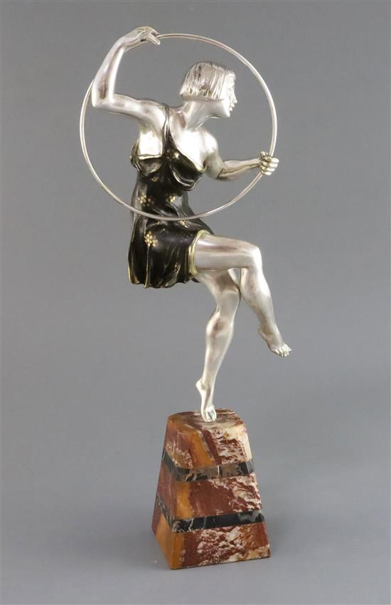 Attributed to G. Limousin. A silvered and bronzed metal figure of a hoop dancer, height 17in.